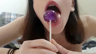 Candy girl fucks and tastes both her holes with a Lollipop
