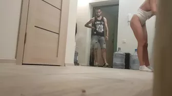 Woman flashes her tits in front of the water delivery boy