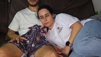 College student watches the game with her stepbrother